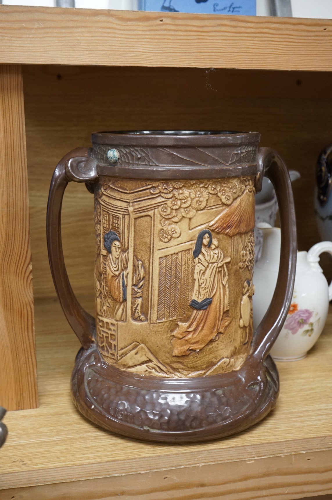 A collection of seven various ceramic vessels including Bretby, Poole, Worcester, continental art pottery etc. 26cm